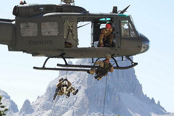 Alpini of the 4th regiment abseiling from an AB205 helicopter during the Falzarego 2011 exercise
