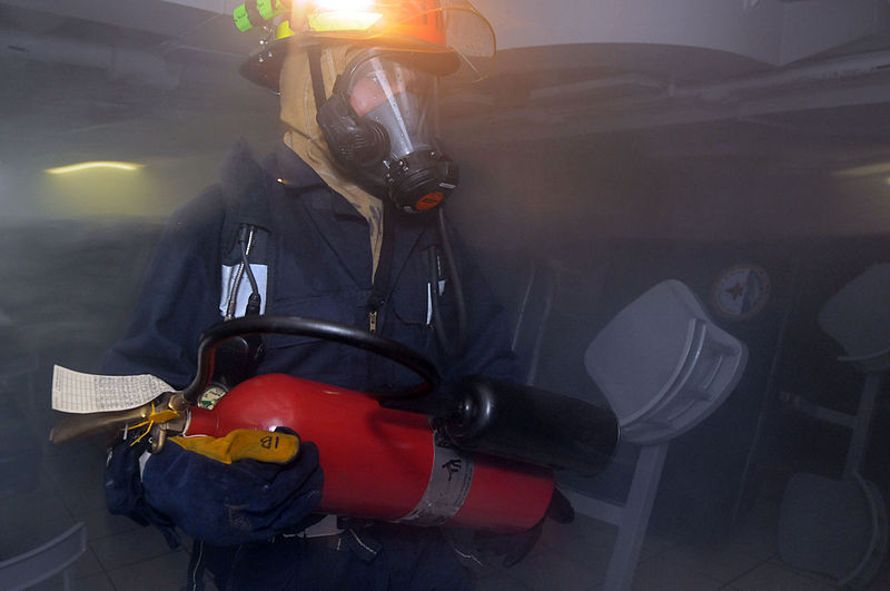 File:A U.S. Sailor carries a carbon dioxide bottle during a general quarters training exercise aboard USS George H.W. Bush (CVN 77), the Navy's newest aircraft carrier, in the Mediterranean Sea June 17, 2011 110617-N-QL471-031.jpg
