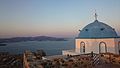 An east side view from Castle of Astypalaia. In the rigt side the White Churche with the stone spiers (1853). A perfect color set of natural eagean sea and evening sky.jpg