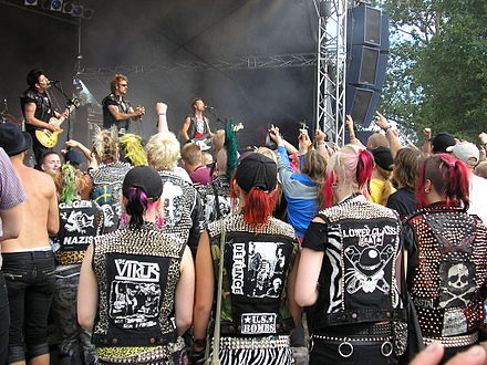 Punk vests are often made from leather and heavily decorated with metal studs