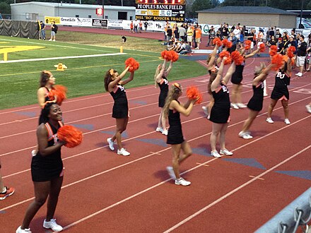 Baker pep squad leading cheers at a game