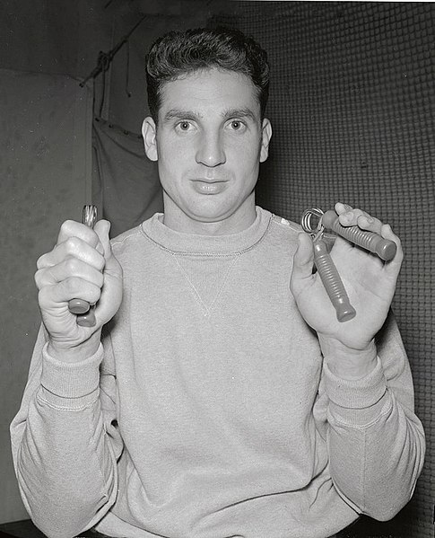 Thomson training his hands in the off-season, 1949