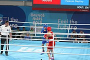 Deutsch: Boxen bei den Olympischen Jugendspielen 2018 Tag 12, 18. Oktober 2018 - Kampf um die Bronzemedaille im Fliegengewicht Mädchen – Heaven Destiny Garcia (USA, blau) schlägt Goryanana Stoeva (Bulgarien, rot) 5-0; Ringrichter ist Ishanguly Meretnyyazov (Turkmenistan). English: Boxing at the 2018 Summer Youth Olympics on 18 October 2018 – Girl's flyweight Bronze Medal Bout - Heaven Destiny Garcia (USA, blue) beats Goryanana Stoeva (Bulgaria, red) 5-0; Referee is Ishanguly Meretnyyazov (Turkmenistan). Español: Boxeo en los Juegos Olímpicos Juveniles de Verano de 2018 en 18 de octubre de 2018 - Combate a medalla de bronce de peso mosca para mujeres: Heaven Destiny Garcia (Estados Unidos, azul) le gana a Goryanana Stoeva (Bulgaria, roja) 5-0; El árbitro es Ishanguly Meretnyyazov (Turkmenistán).