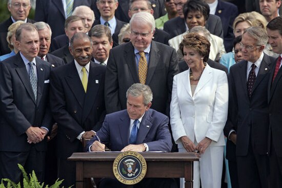 United States President George W. Bush signs amendments to the Act in July 2006