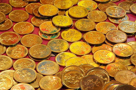 Token coins in an arcade game