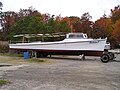 Deadrise workboat barbara j broadside on land.JPG