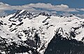 Dome Peak (left), Sinister Peak (center), Gunsight Peak (right) seen from SSE at Cloudy Pass