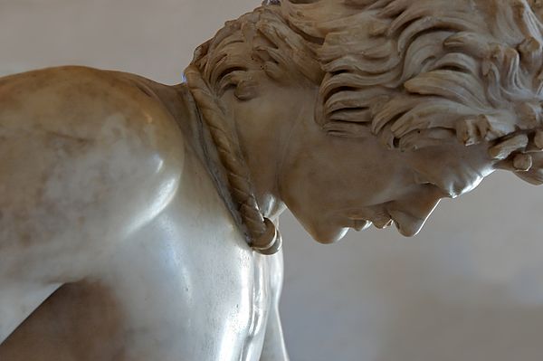 Dying Gaul, Roman copy of a Hellenistic sculpture of a dying Galatian warrior, wearing a torc. Capitoline Museums.