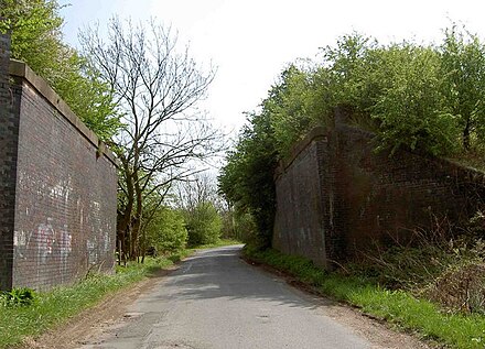 Remains of a bridge of the line between Laughton Junction and Ravenfield near Thurcroft Former bridge abutments on Newhall Lane - geograph.org.uk - 1268072.jpg