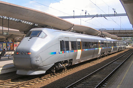 Flytoget (airport express) at Oslo Central Station. Flytoget takes 20 minutes to get from Gardermoen to Oslo central, slightly quicker than local trains, and much faster and cheaper than taxis.