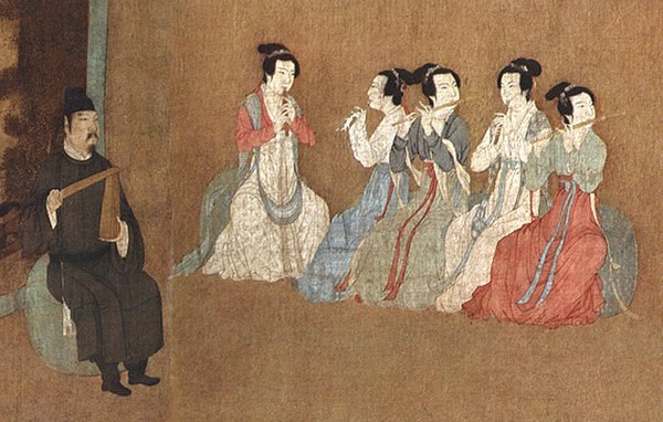 Detail of the 12th century Song Dynasty painting Night Revels of Han Xizai depicting two dizi players, with three guan (ancient oboe-like instrument) 