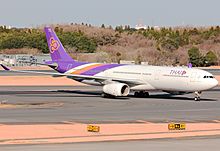 An Airbus A330-300 of Thai Airways at Tokyo Narita HS-TBG (17127714151).jpg