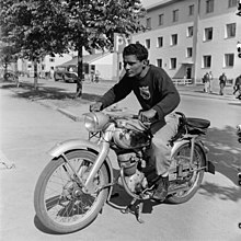 A member of the delegation at the Olympic village Helsingin olympialaiset 1952 - N210757 - hkm.HKMS000005-000002gh.jpg