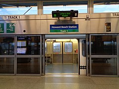 Platform screen doors at the AirTrain JFK's Howard Beach station