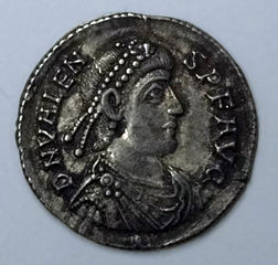 Obverse of a coin featuring the profile of a crowned man facing right, with surrounding inscription.