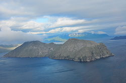 Igitkin Island. Great Sitkin Island can be seen in the background.