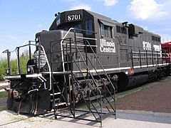 A preserved Illinois Central EMD GP11 locomotive on static display in downtown Carbondale, Illinois