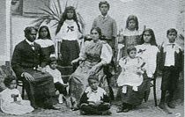 J. C. A. Corea is seated by the side of his father, Gate Mudaliyar James Edward Corea of Chilaw, surrounded by his brothers and sisters. James Edward Corea and Family.jpg