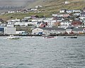 Norðoyastevna in Klaksvík, rowing competition in the category of the largest boat types, called 10-mannafør. The white and red boat in the middle is Klaksvíkingur from Klaksvík.