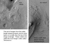 Camadas em uma velha cratera na região de Arabia Terra. As camadas podem formar-se dos vulcões, do vento, ou pela deposição sob a água. As crateras à esquerda são crateras em pedestal. Imagem fotografada pela Mars Global Surveyor.