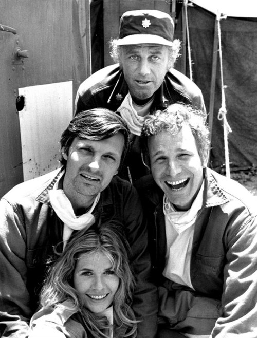 Alda (left of center) as Hawkeye Pierce in M*A*S*H, 1972