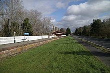 Remains of the up platform and the A6901 which occupies the former down platform Melrose railway station03 2017-03-17.jpg