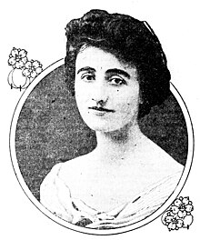 Portrait of a young woman in an off-shoulder dress