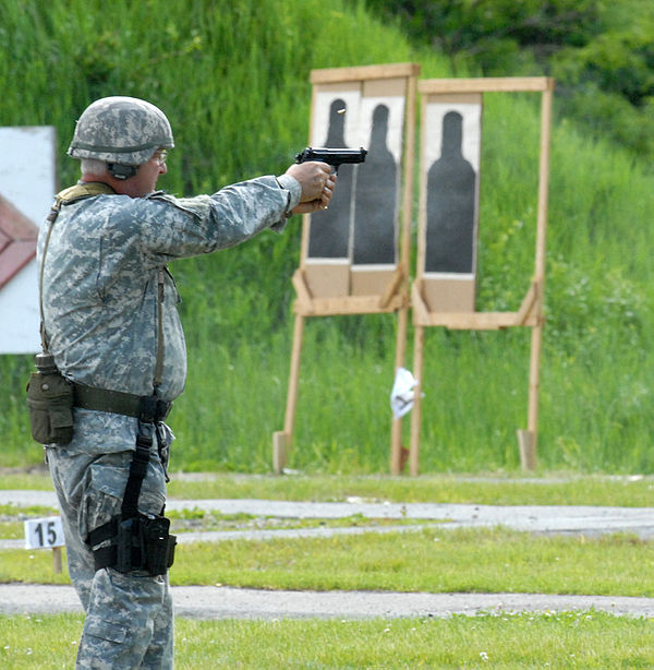 New York Guard Staff Sgt. Joseph Dee fires an M9 pistol during the 35th Annual "TAG (The Adjutant General) Match.