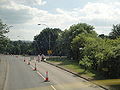 Fairlee Road, Newport, Isle of Wight photographed during the Isle of Wight Festival 2010. As can be seen, the road has been restricted to only allow traffic towards Newport due high pedestrian numbers walking towards the Festival site over the weekend, causing buses and other vehicles to be diverted along other roads. After the end of each act on the night the road is closed in both directions.