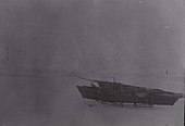 Каяк і нарти на тлі айсберга. Земля Франца-Йосипа, серпень 1895