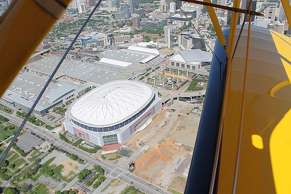 Aerial photo of Georgia Dome; the land next to it has been cleared for construction of the new Mercedes-Benz Stadium.