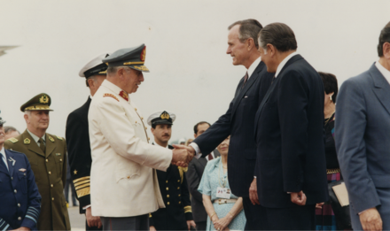 Pinochet as Commander-in-Chief and President Aylwin meeting with U.S. President George H. W. Bush in 1990