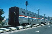 A "step down" or transition coach on the Pioneer in 1994. The vestibule is on the lower level. Pioneer at The Dalles, August 1994.jpg