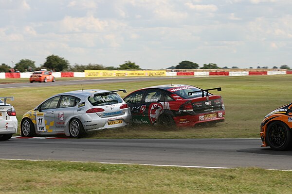 Championship rivals Jason Plato and Fabrizio Giovanardi collide at Snetterton.