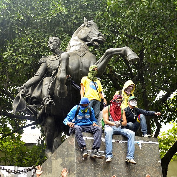 Image: Protesters Bolivar Statue