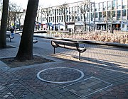 Only a circular ring indicates location of a retracted urinal