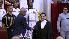 President Kovind administering the oath to Dipak Mishra.