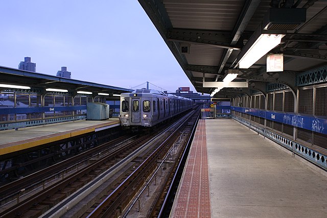 Girard Station platform with A train arriving