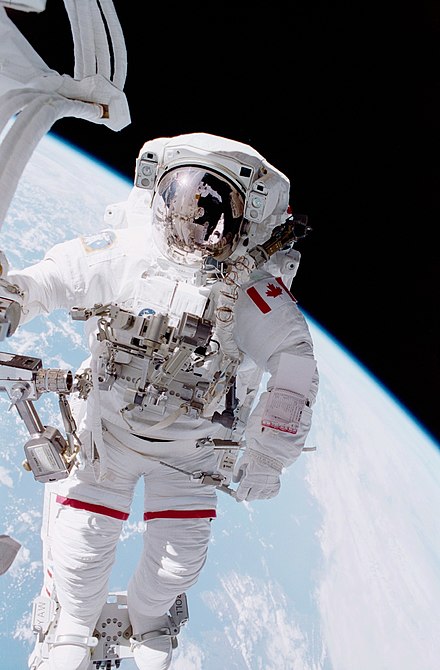 Hadfield spacewalking during the STS-100 mission