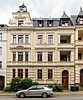 Apartment building in closed development with front garden