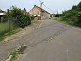 Et au niveau de l'ancien site en siège spécial entre la rue Saint-André et la rue du Commerce, vu ici à l'ancien passage à niveau de la rue du Marais.