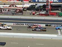 Koga (No. 11) racing Matt Levin (No. 10), Ron Norman (No. 40) and other cars in the West Series race at Sonoma in 2017 Takuma Koga Ron Norman 2017 Carneros 200.jpg