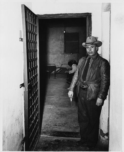 File:Taos County, New Mexico. Down a short corridor from the sheriff's office is the door of the county . . . - NARA - 521884.jpg