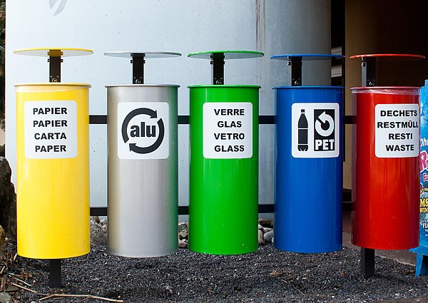 Bins to collect paper, aluminium, glass, PET bottles and incinerable waste