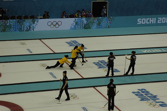 Chinese women's curling team (in yellow)