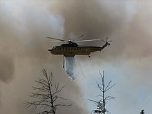 A Carson Helicopters Fire King drops on the 2007 WSA Lightning Complex fire. Wsa-lightning-complex S61type1-drop ron-blaylock.jpg