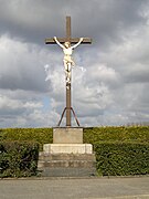 La croix de la rue Saint-Vincent est un crucifix en bois dont le Christ est en fonte