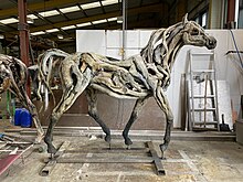 "Apollo" by Heather Jansch. Bronze cast from the driftwood original, shown fresh from construction in the foundry at Basingstoke. "Apollo" by Heather Jansch.jpg