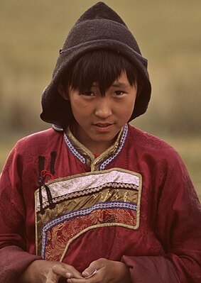 Buryat boy Bato-Tsyren during shamanic rite "Shandruu". Not far from Ulan-Ude, Buryatia, Siberia.