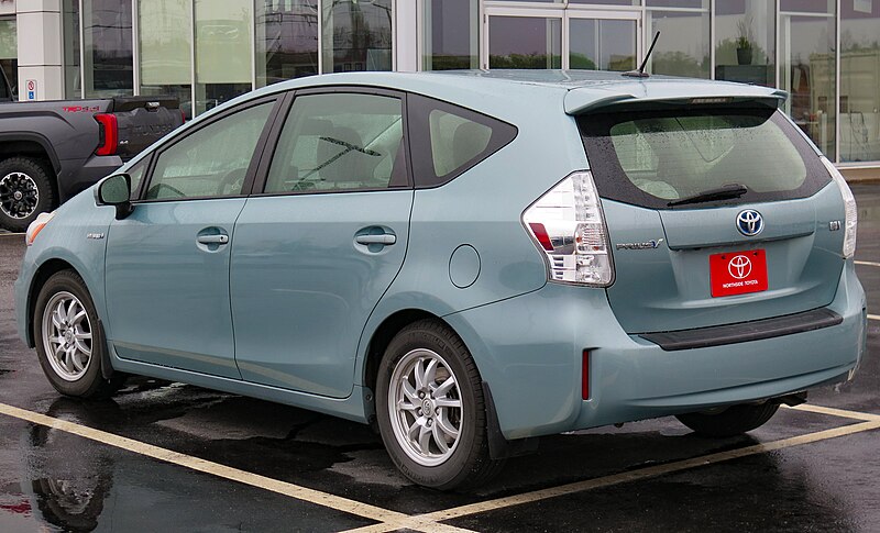 File:2013 Toyota Prius V Standard Package in Sea Glass Pearl, Rear Left, 04-23-2023.jpg